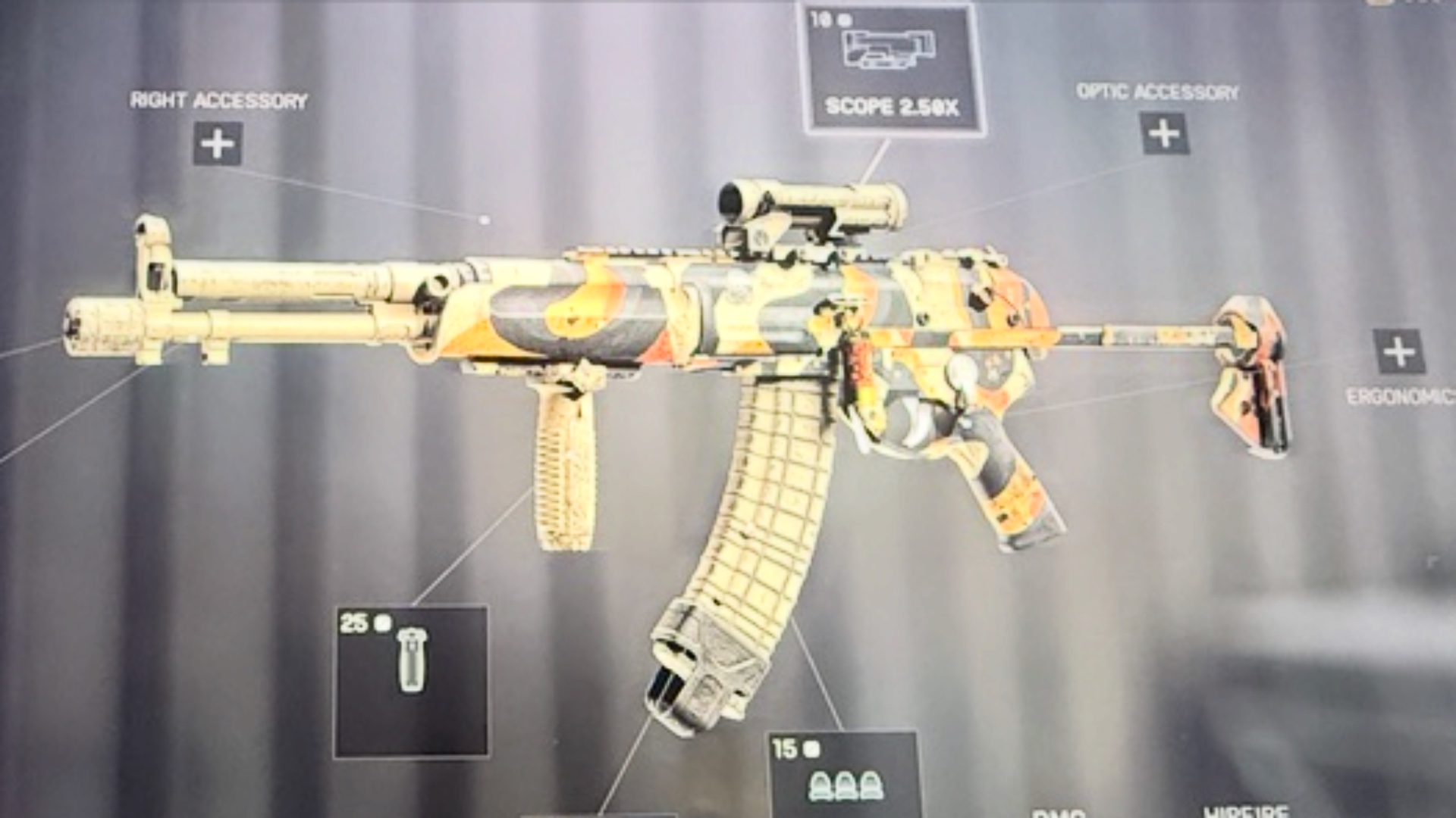 Kord 6P67 assault rifle in orange and tan camo with 2.50x scope